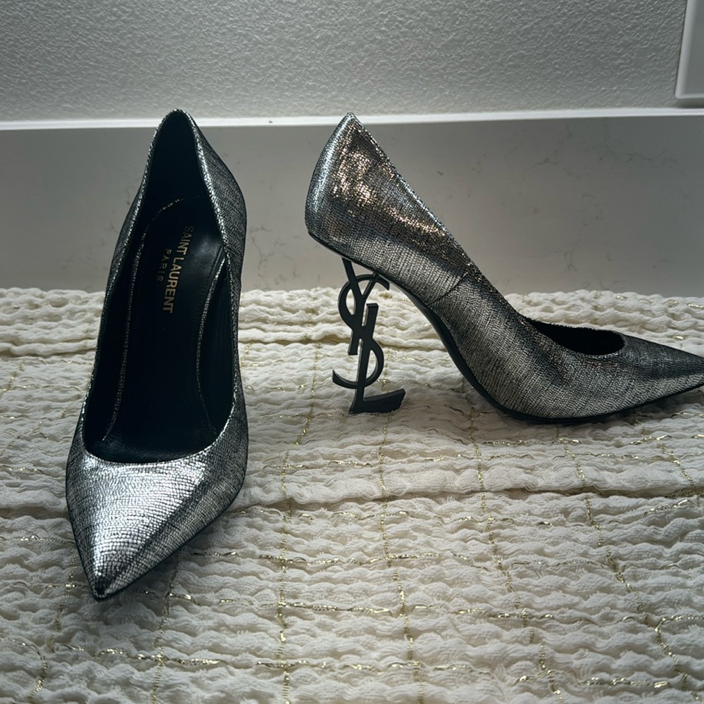 OPYUM PUMPS IN SILVER. Like new, worn once.